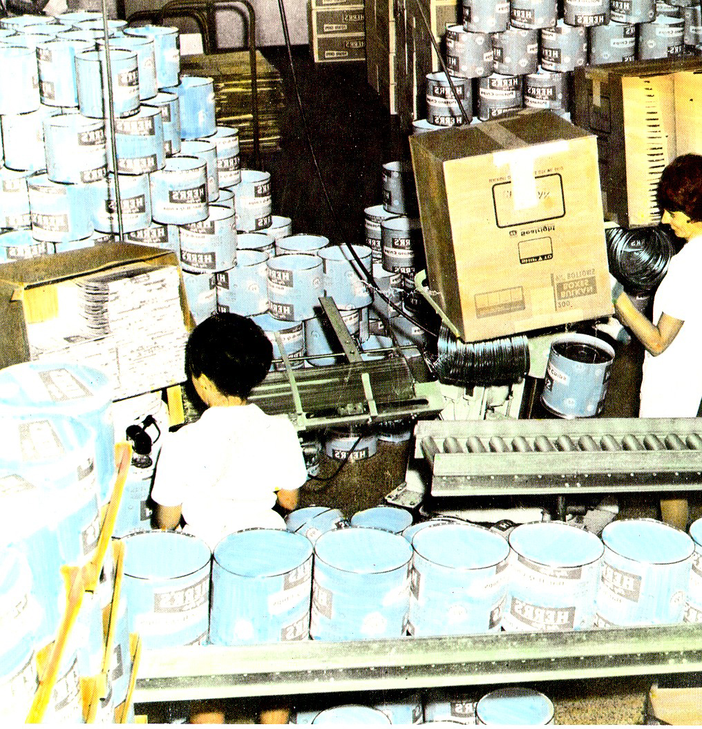 Herr's employees packaging the new cardboard barrels that were created in 1964